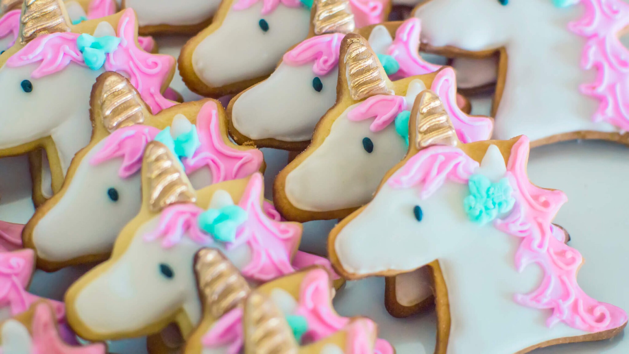 Close up of freshly baked unicorn shape cookies