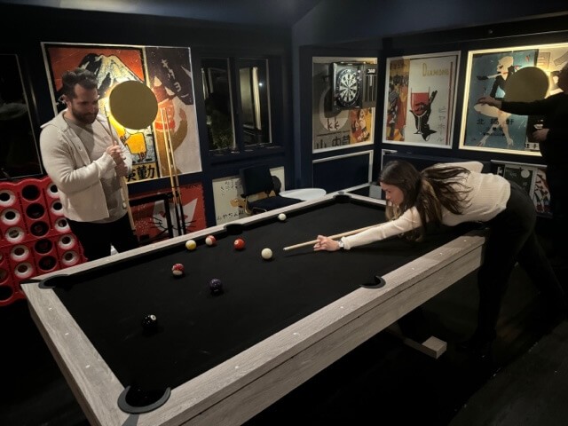 The chic black and white pool table at Kizzy T's Kizzy Tavern, East Hampton