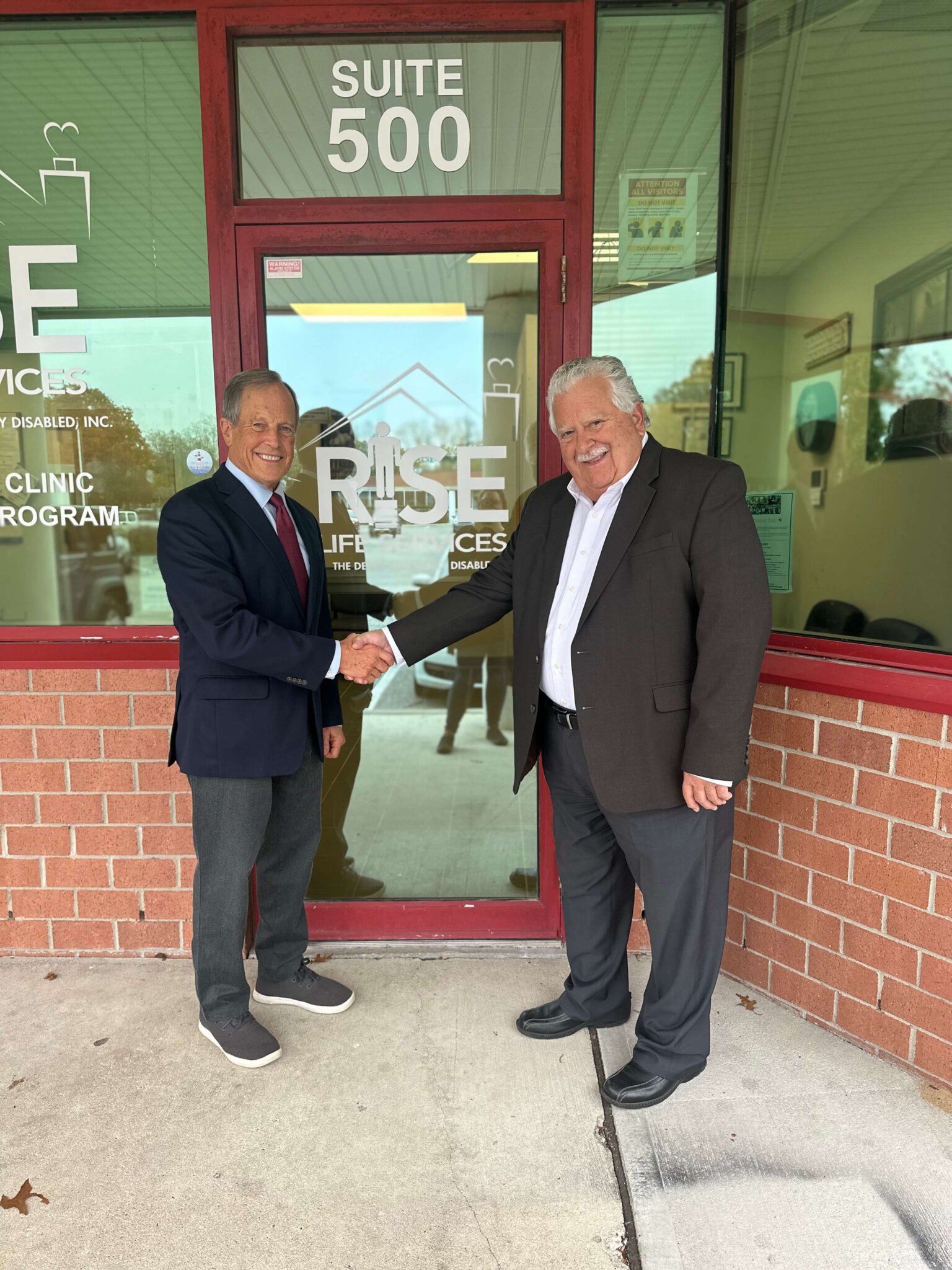 RISE Life Services Board President Gregory Blass with Executive Director Charles Evdos