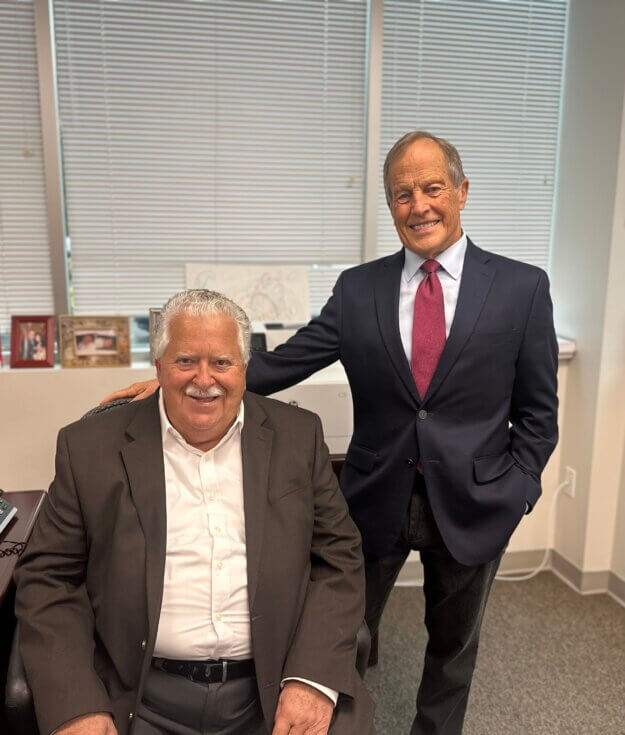 RISE Life Services Executive Director Charles Evdos with Board President Gregory Blass