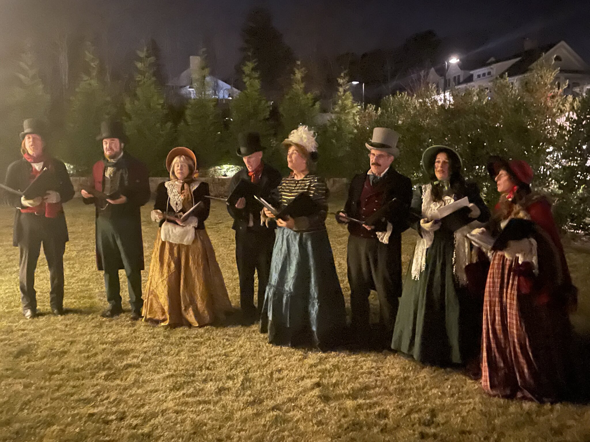 Costumed carolers at the Canoe Place tree lighting