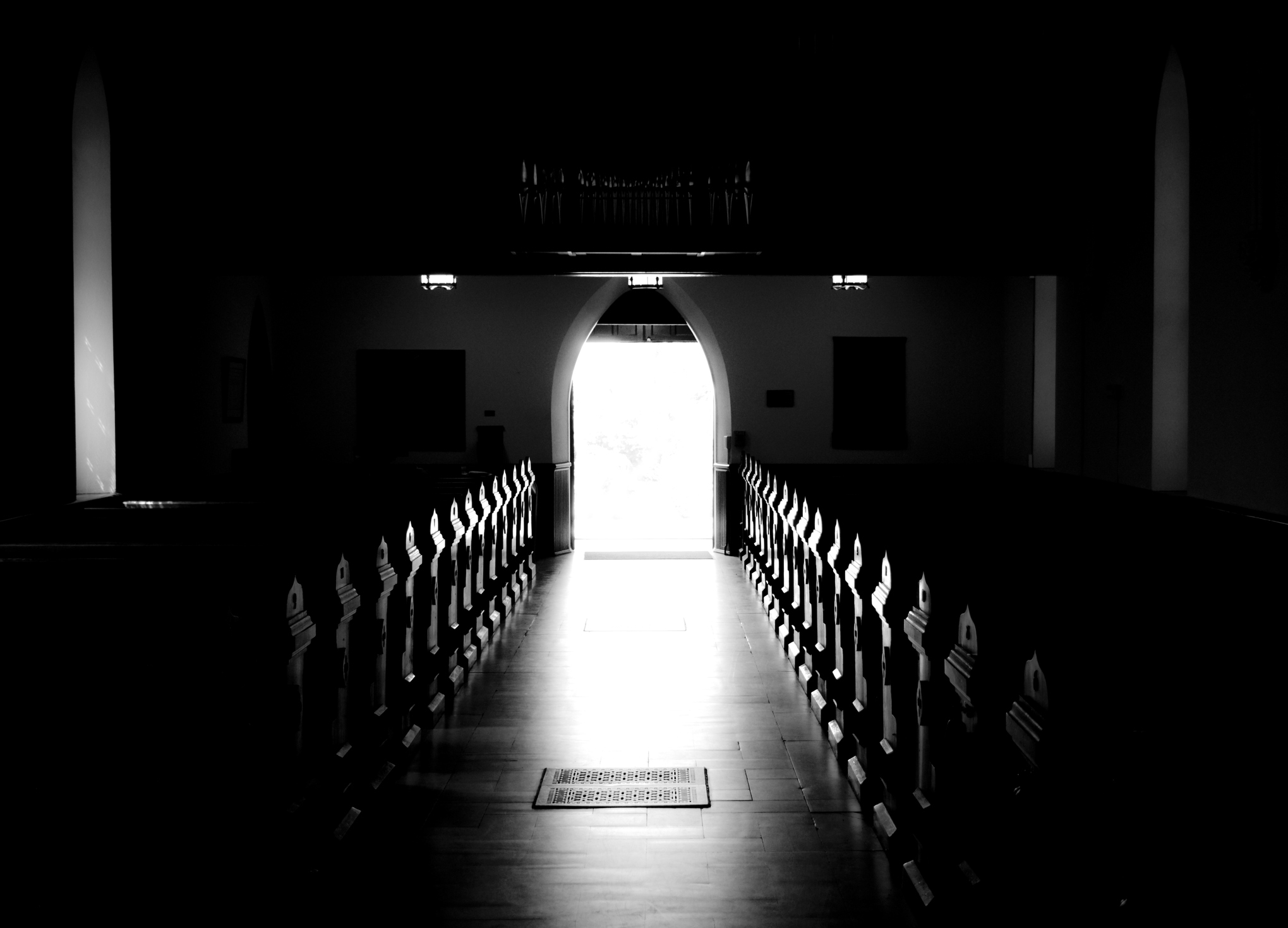 Glowing Church Aisle, Pews Illuminated B&W