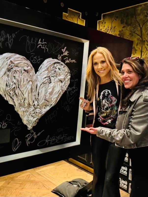 Sheryl Crow signing Jennifer Jo Contini's "Platinum Love"
