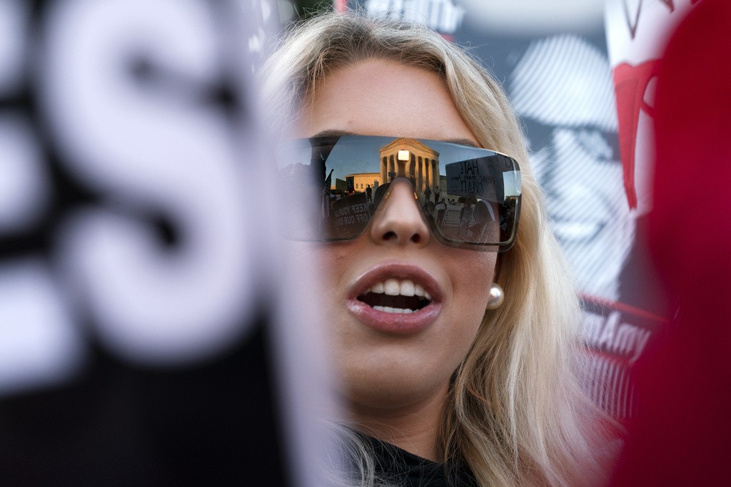 Former Zeldin intern Isabella DeLuca, of Long Island, N.Y., appears outside the Supreme Court, Oct. 26, 2020, on Capitol Hill in Washington. (AP Photo/Jacquelyn Martin, File