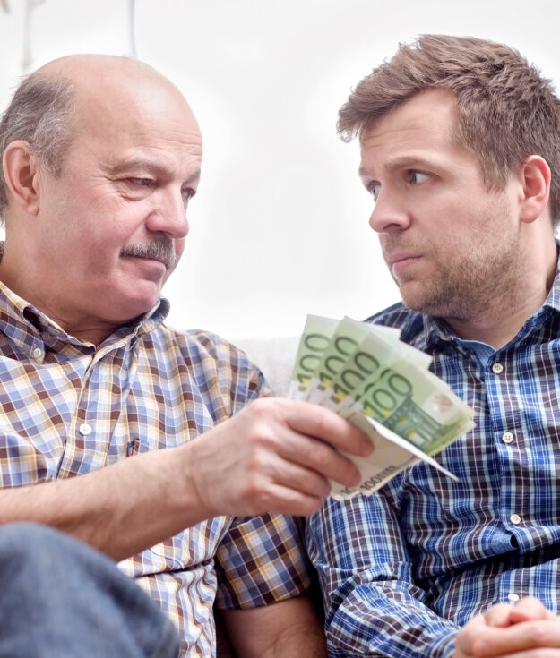 Elderly father lends money to his adult child son. He helps his child deal with financial problems.