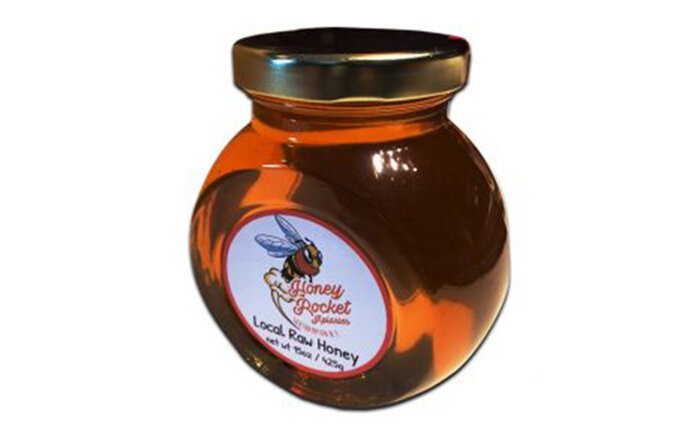 An 8 oz jar of Honey Rocket Apiaries honey