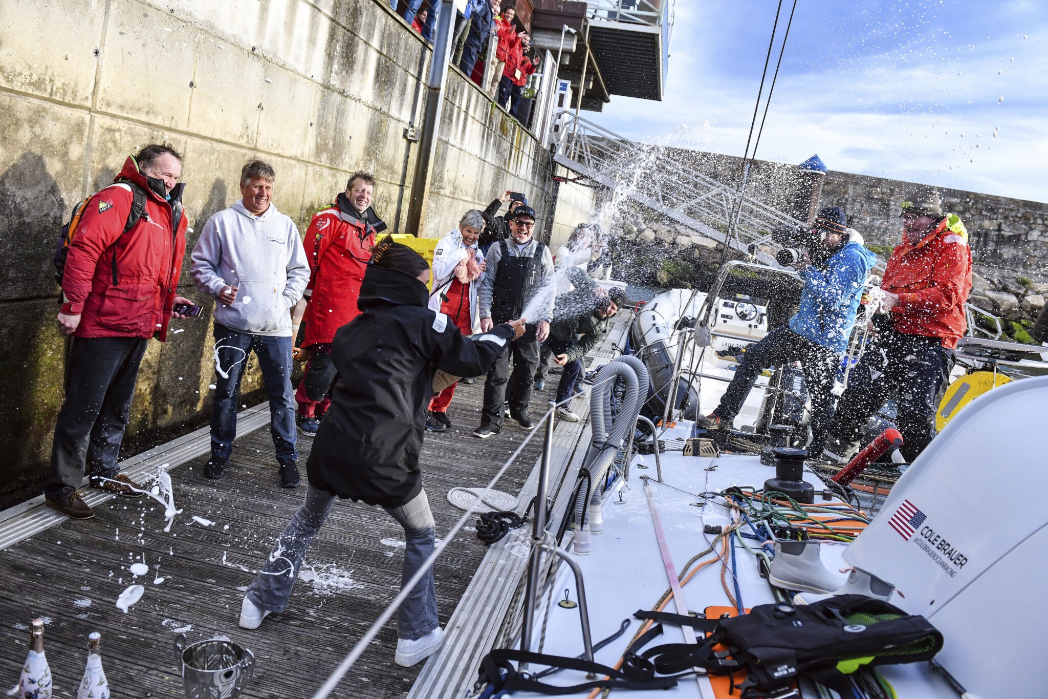 Champagne flew as Cole Brauer celebrated her historic trip