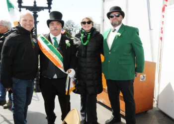 David Lys, Grand Marshal Steve Puck Dolan, Montauk Friends of Erin President Brian Matthews at Montauk's St. Patrick's Day Parade
