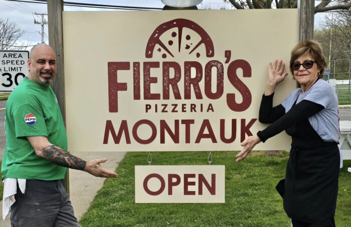 Fierro's Pizzeria Montauk team with their new sign