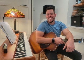 Brian Quillin in his interim teaching space, which his Greenport neighbors graciously offered to him while his apartment is remodeled.