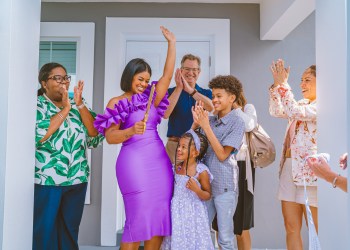 Diana Mores cutting the ribbon at Home Dedication