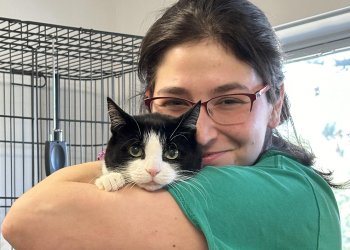 ARF worker Hannah Metcalf and a cat named Julie