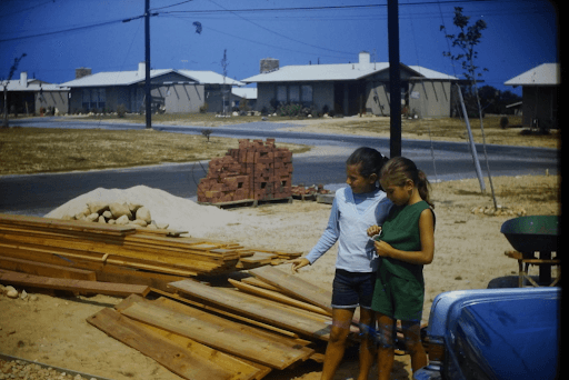 1965 in Culloden Shores: fencing and patio materials are delivered in Montauk