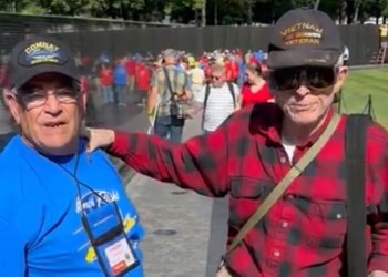 L.-R.: Vietnam War veteran Vincent Dellipaoli reunites with medic James Hennessy at the Vietnam Memorial on Oct. 5, 2024 (Bill Donohue)