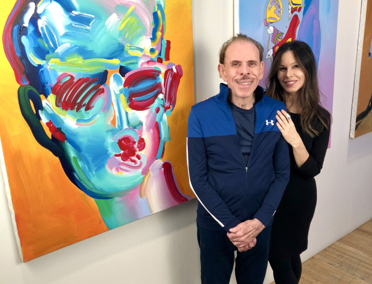 Artist Peter Max and his daughter Libra Max in his New York City Studio in 2019.