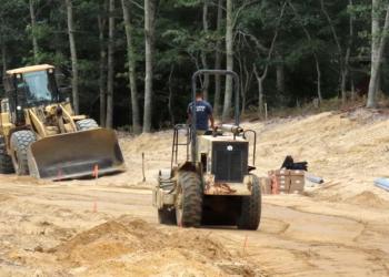 Construction vehicles at the Shinnecock Indian Nation's plan for a 10-acre gas station and travel-plaza at Westwoods on eastern Sunrise Highway in Hampton Bays on September 23, 2024