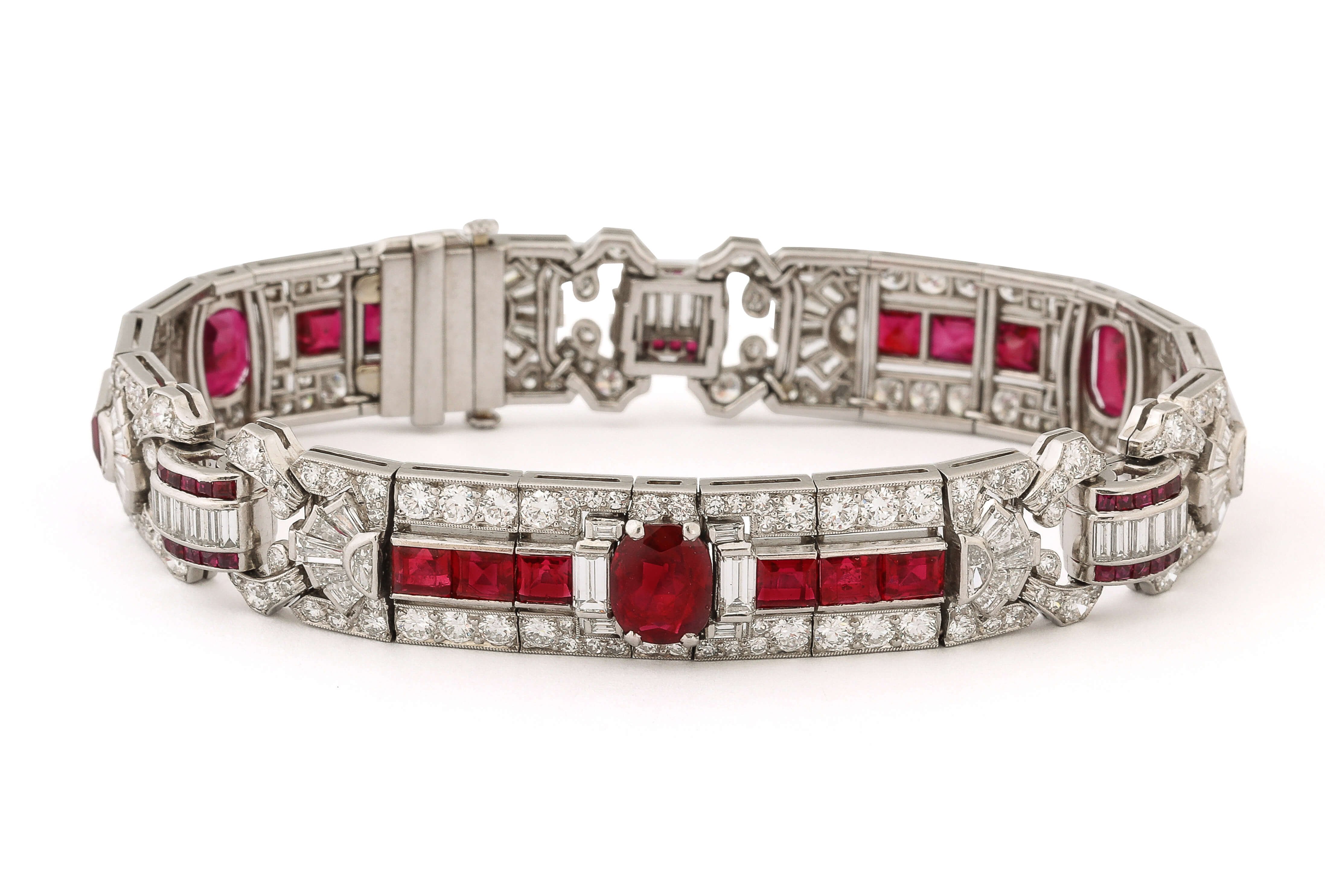 A La Vieille Russie, NYC: Burma ruby and baguette- and brilliant-cut diamond bracelet set in platinum. Raymond Yard, American, ca. 1935 at The Winter Show