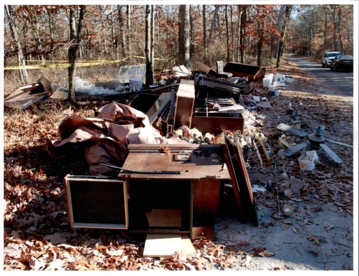 Authorities say two men dumped this pile of trash in the pine barrens (SCDA)