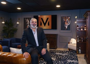 Dr. Miquel in the Men's Only Medical member's lounge
