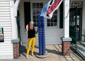 Donna Corvi at the front of The Depot Gallery.