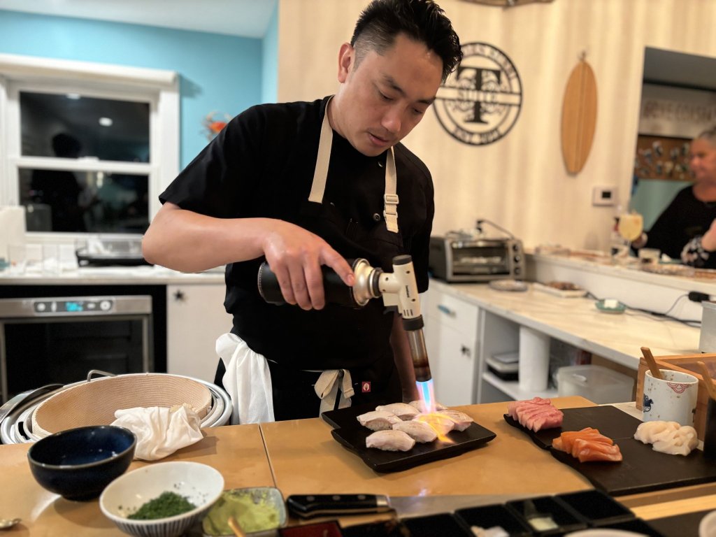 The chef prepares a roll at the Sushi by Boū experience in Westhampton Beach.