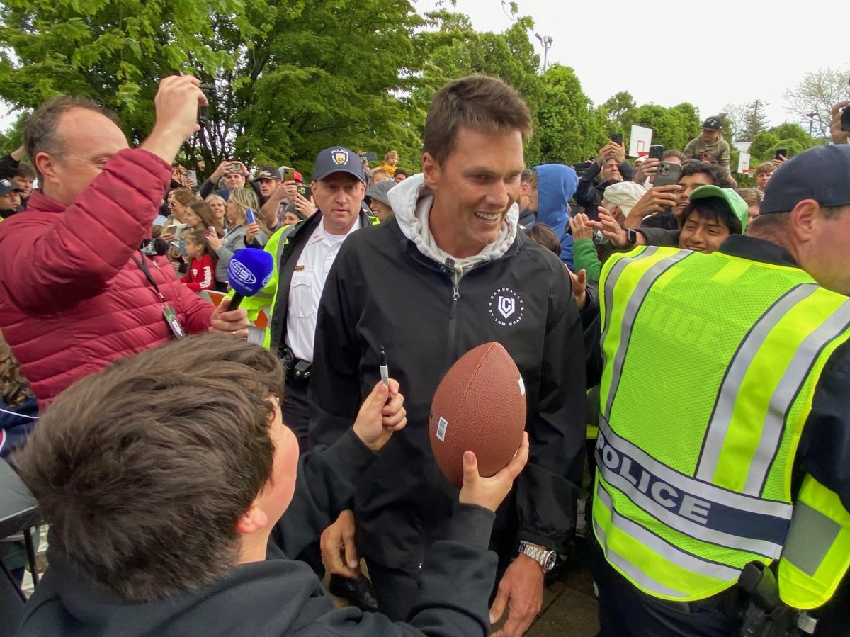 NFL legend Tom Brady is greeted by fans in East Hampton
