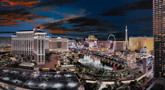 Bertrand Meniel's "Las Vegas" painting (2021-22, acrylic on linen, 50 x 90 inches), which Louis Meisel believes may contain more information than any work of photorealism ever created