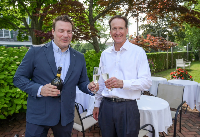 Chef Rocco DiSpiritoo and Southampton Mayor Bill Manger toast Rocco's new pop up restaurant: "Pop Up by Rocco."