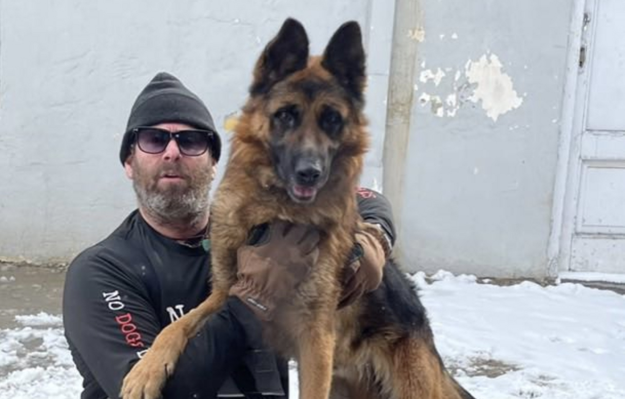 Jeffrey Beri and one of his rescued dogs from No Dogs Left Behind