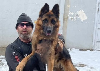 Jeffrey Beri and one of his rescued dogs from No Dogs Left Behind