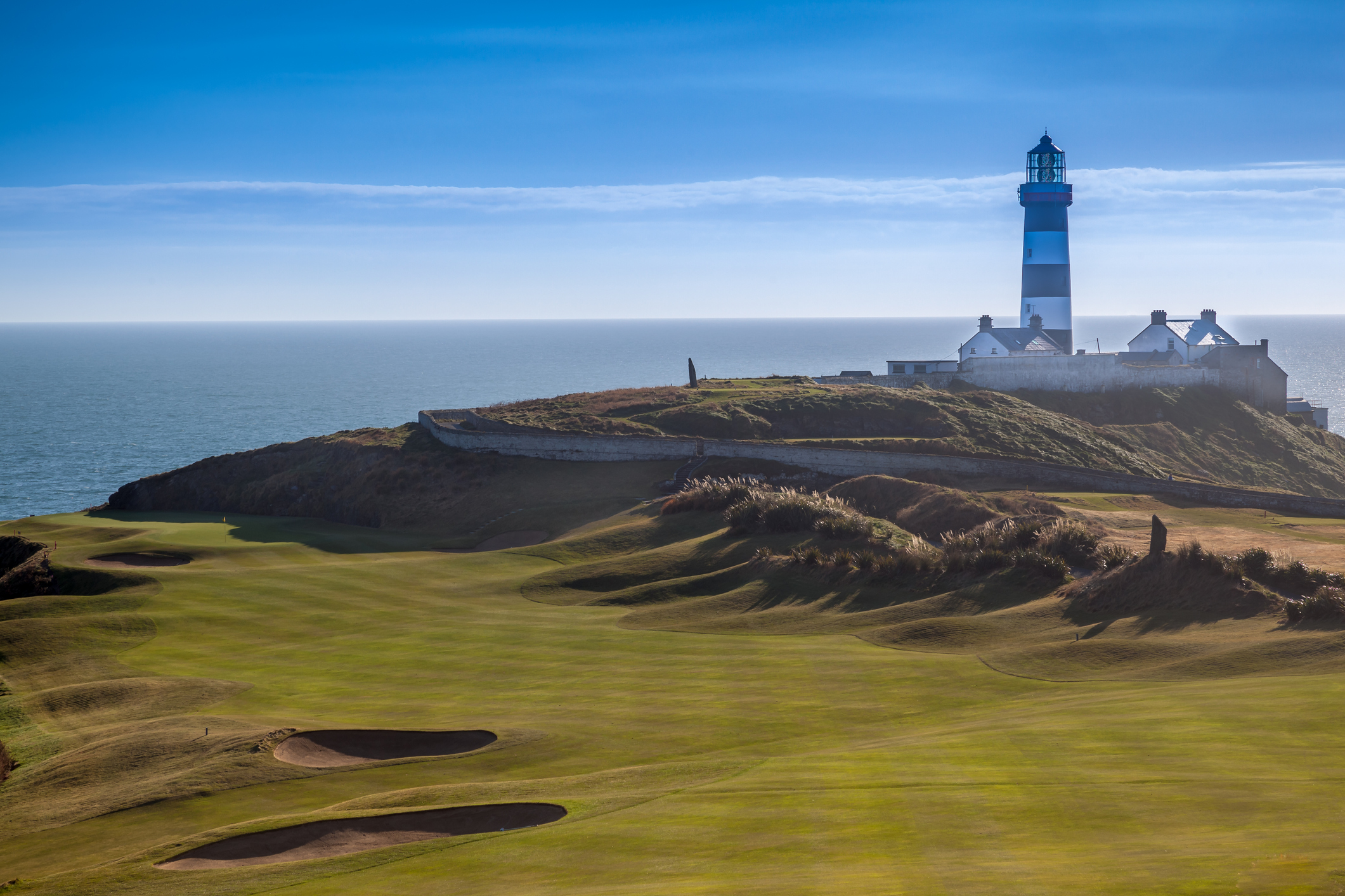 The stunning golf course and lighthouse at the Old Head Of Kinsale in County Cork, Ireland