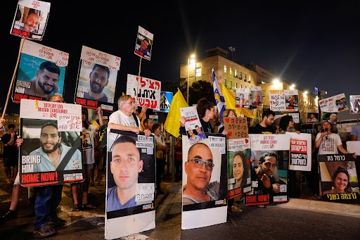 Demonstrators attend a protest demanding the release of all the hostages kidnapped during the deadly October 7, 2023, attack on Israel by Hamas, outside Israeli Prime Minister Benjamin Netanyahu's office, in Jerusalem, July 13, 2025.