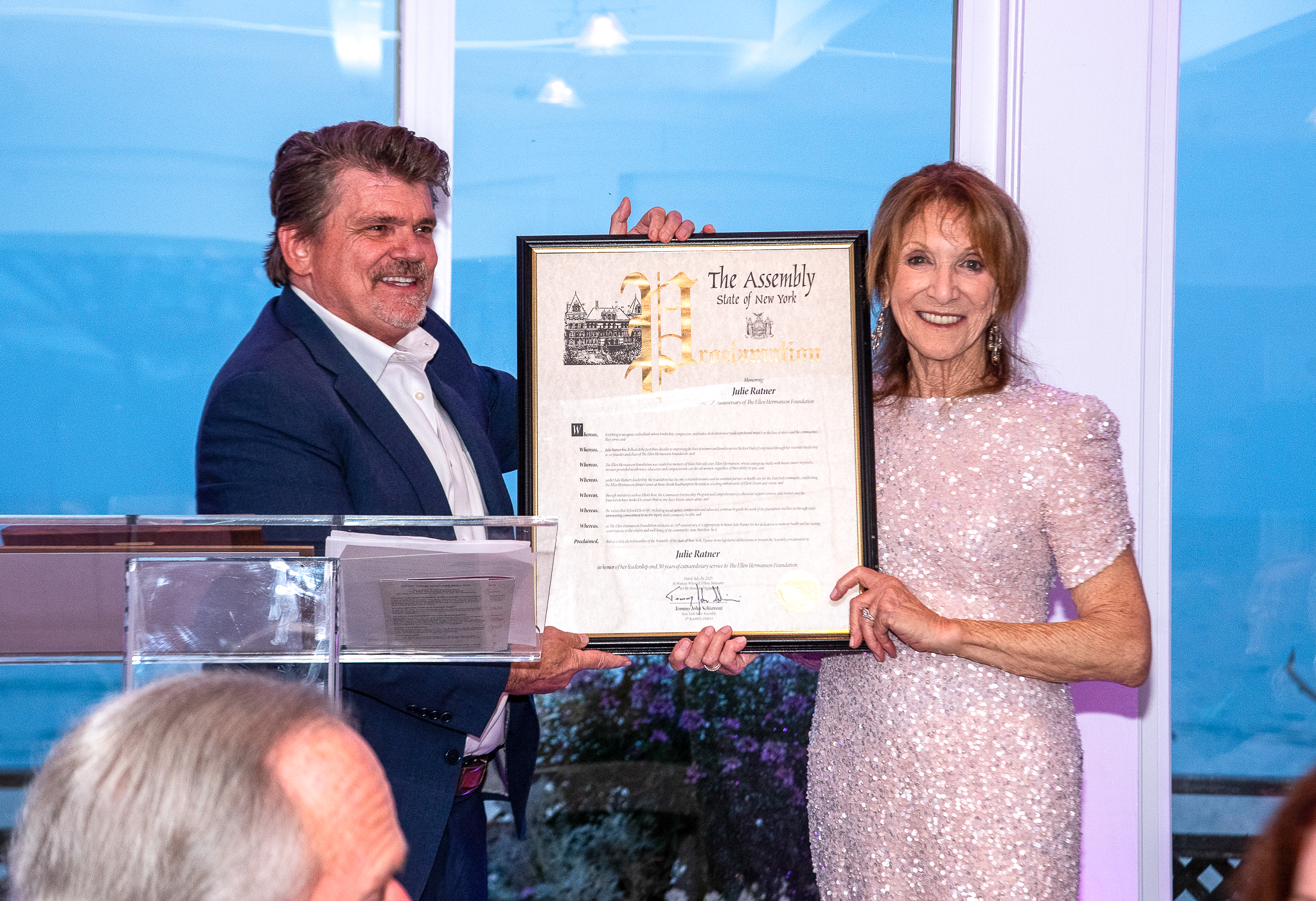 Assemblyman Tommy John Schiavoni presents Julie Ratner with a Proclamation