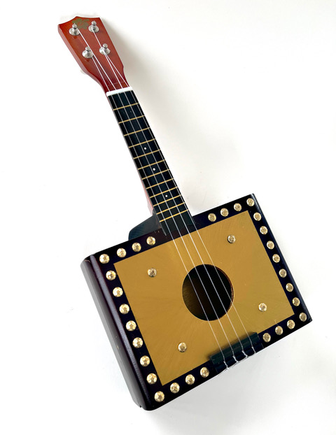 "Cigar Box Ukeuele" by Will Ryan is part of the 2025 East End Hospice Box Art Auction