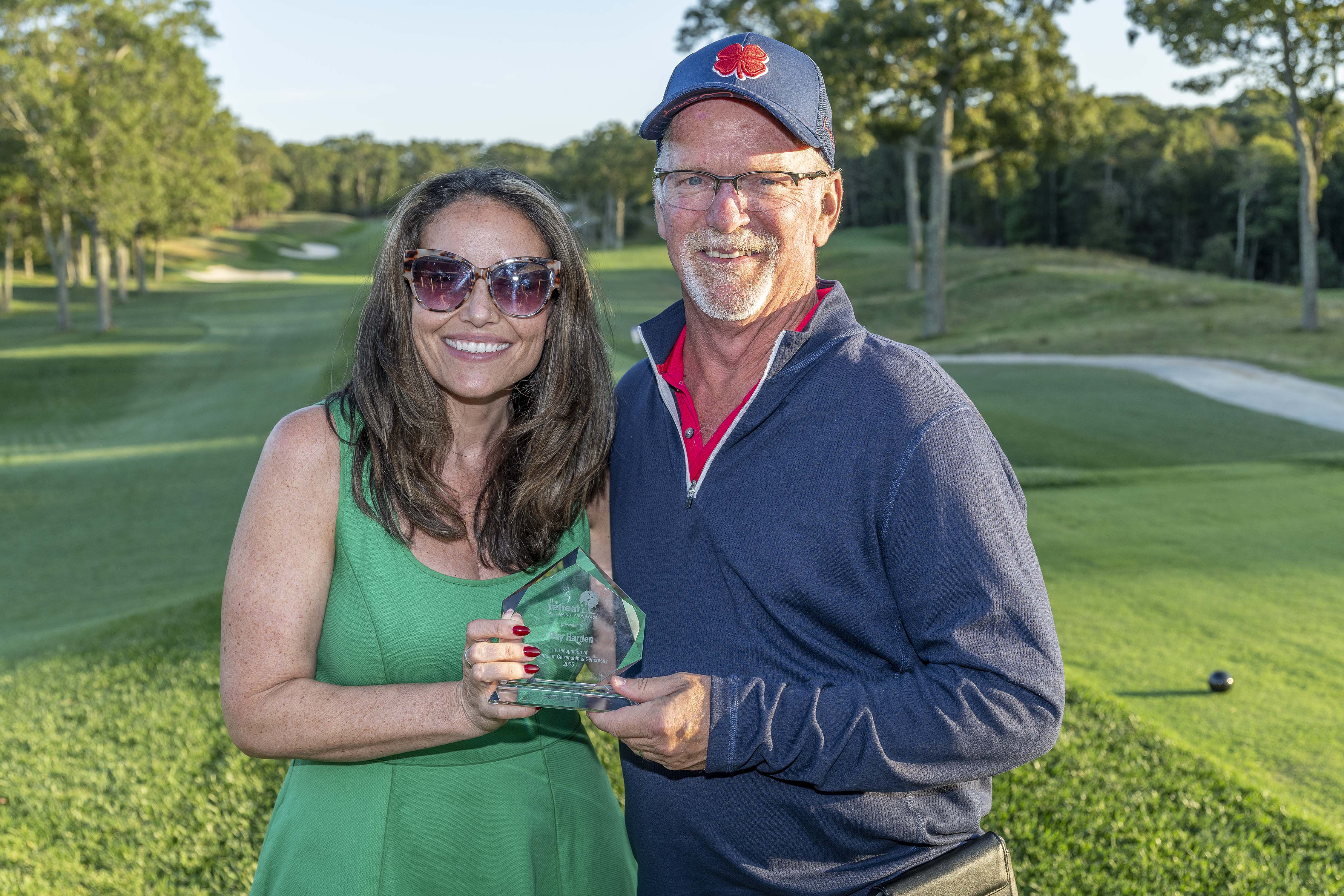 Cate Carbonaro, Executive Director at The Retreat, with Ray Harden, the Honoree at The Retreat’s Annual Golf Outing on September 22.