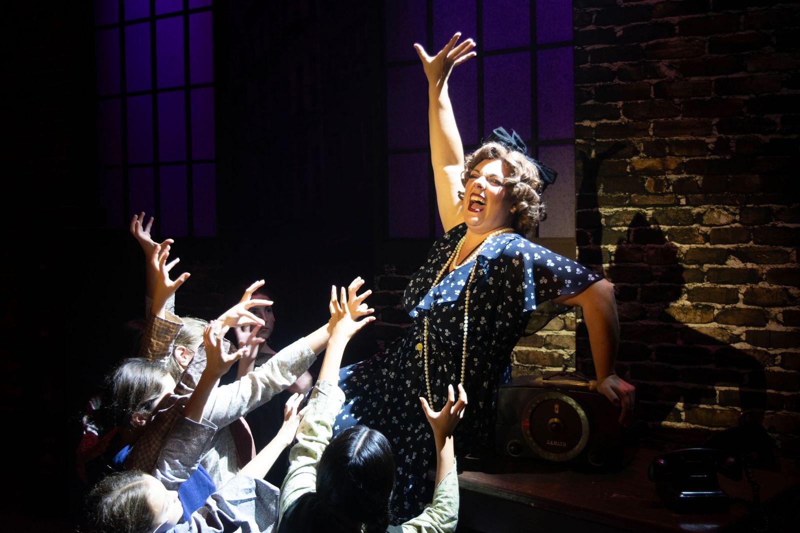 Julianne Greaves as Miss Hannigan in Annie at Theatre Three