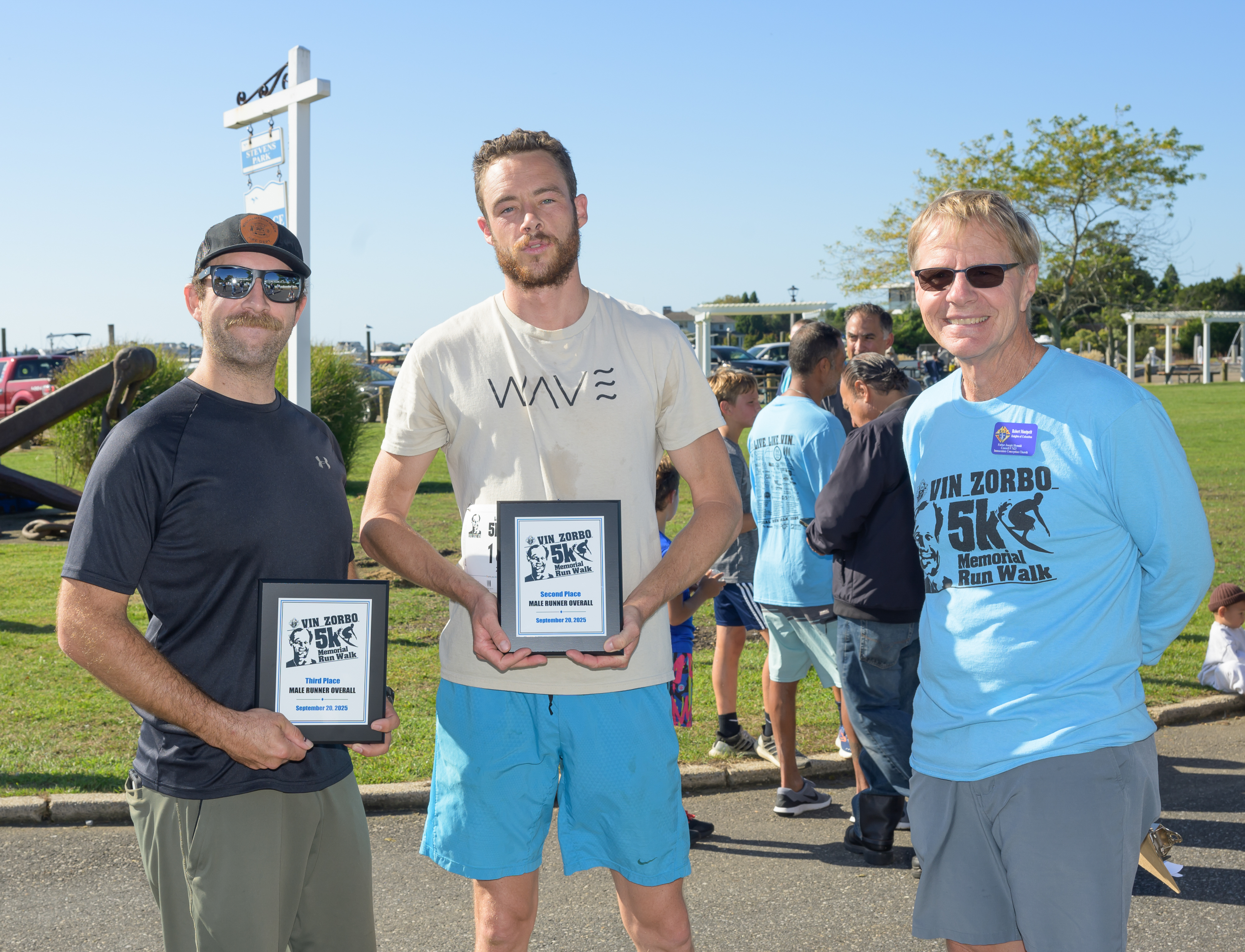 3rd & 2nd Place Male Runners Overall Michael Jones & Jef Wachfenfeld with Bob Montpetit