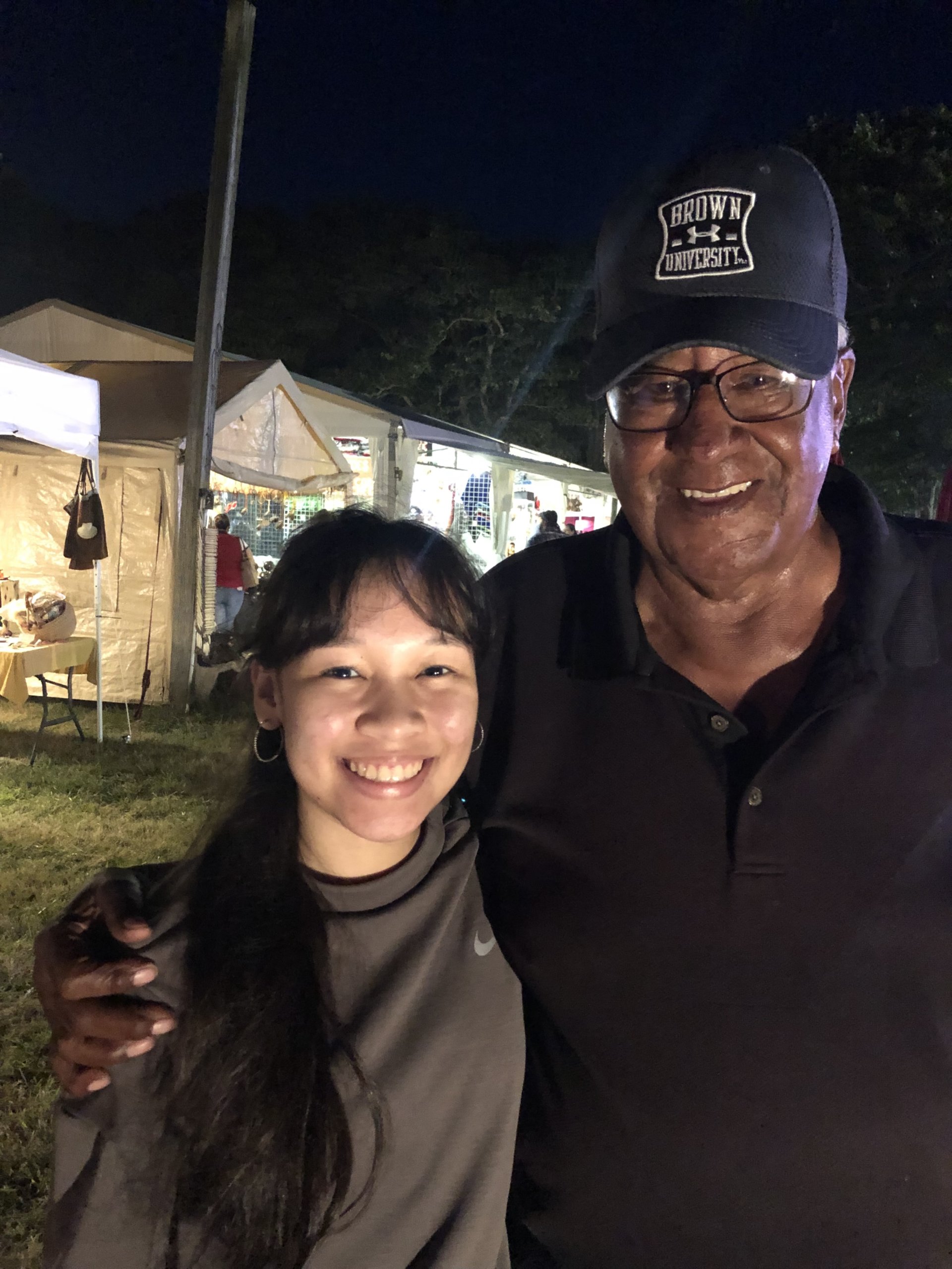 Asia Cofield and her grandfather Donald Williams Sr. at the 2019 Shinnecock Powwow
