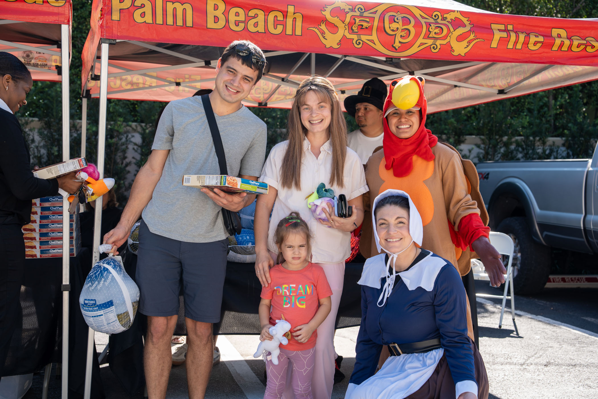 Mykhailo, Nadiia, Tom the turkey Ilse Olivares, Andrii and pilgrim Amanda O’Connell
