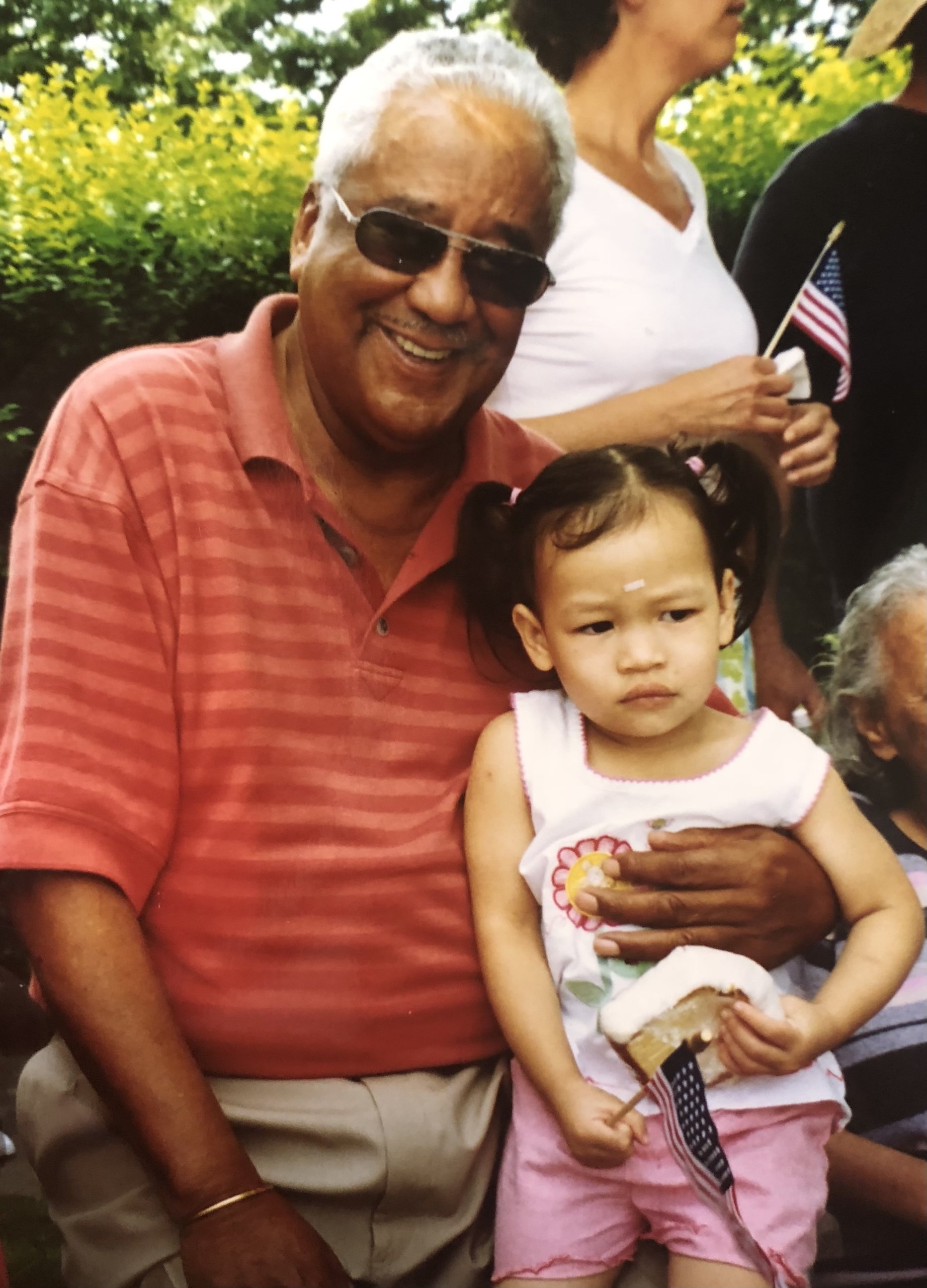 A young Asia Cofield on the lap of her grandfather, Donald Williams Sr.