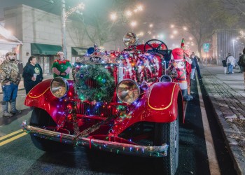 A fire truck all decorated up in the 2024 Greenport Holiday Stroll.