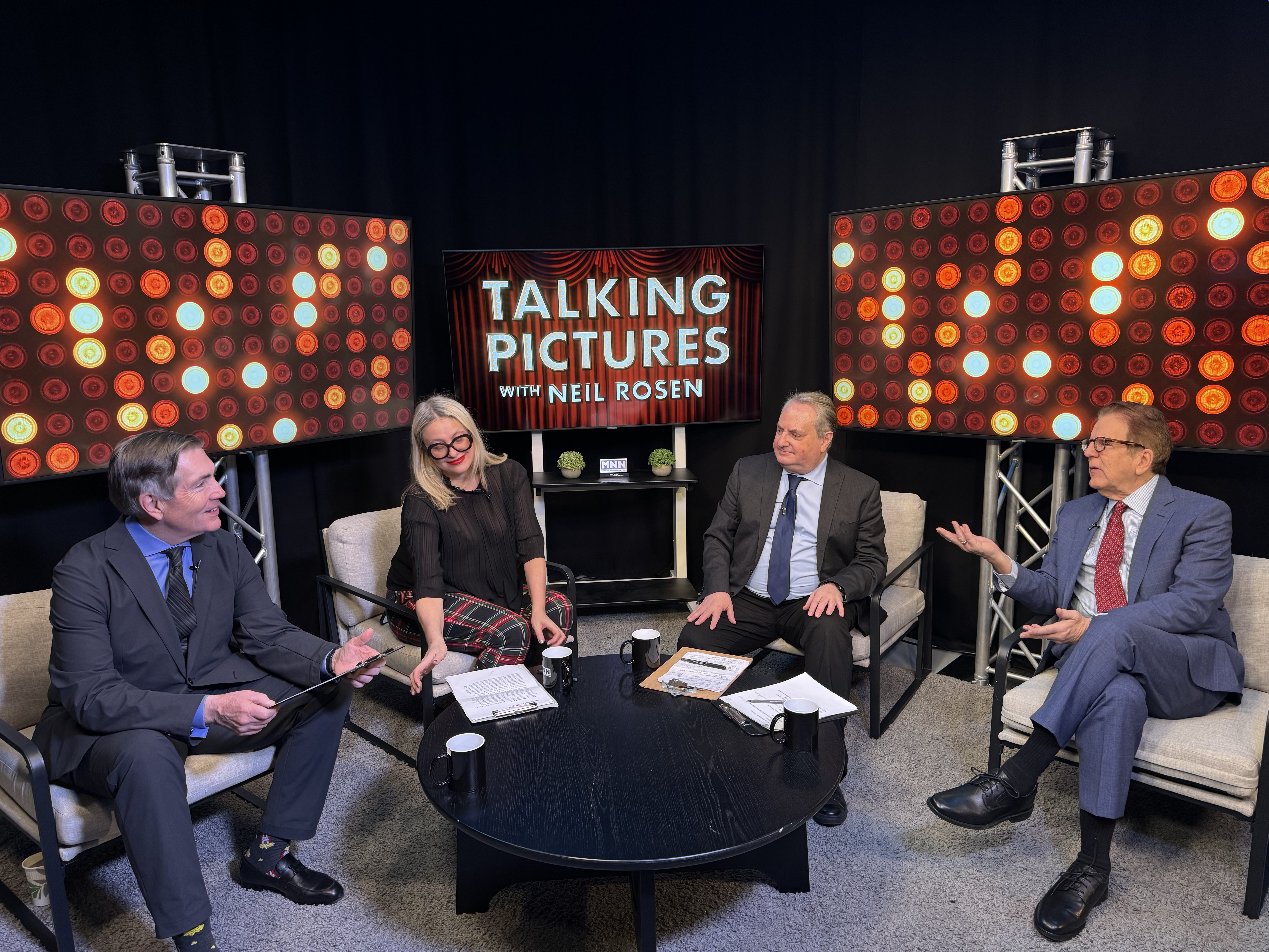 Photo: (L to R) McCuddy, Lisa Rosman, Ed Douglas and Neil Rosen on the set of PBS/All Arts show