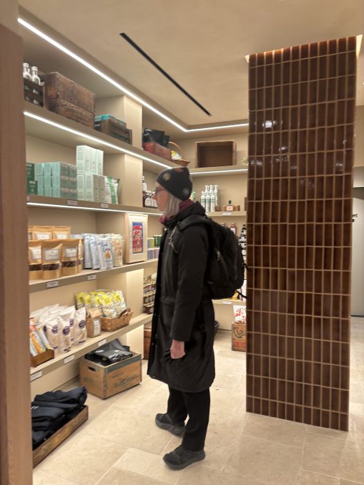 A shopper contemplating the selection at Meadow Lane.