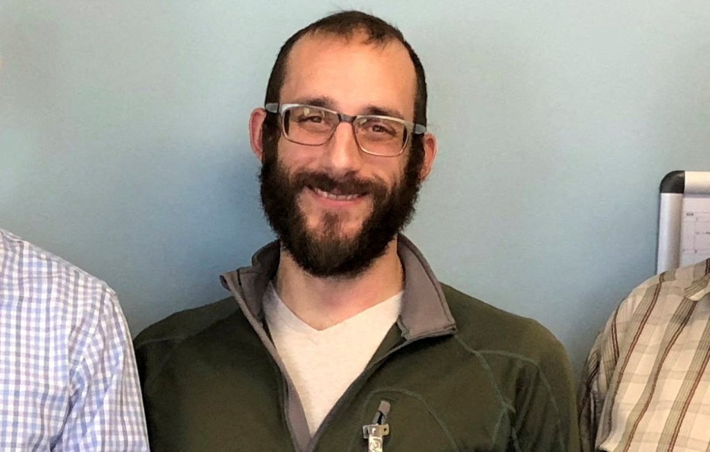 FILE PHOTO: An undated handout image of Alex Pretti, who was fatally shot by U.S. immigration agents as they tried to detain him in Minneapolis, Minnesota, U.S., obtained by Reuters on January 25, 2026. U.S. Department of Veterans Affairs/Handout via REUTERS THIS IMAGE HAS BEEN SUPPLIED BY A THIRD PARTY. MANDATORY CREDIT. EDITORS PLEASE NOTE: THIS IMAGE HAS BEEN CROPPED BY REUTERS FROM THE ORIGINAL PHOTOGRAPH AS TO NOT IDENTIFY THE OTHER PEOPLE IN THE PHOTOGRAPH./File Photo