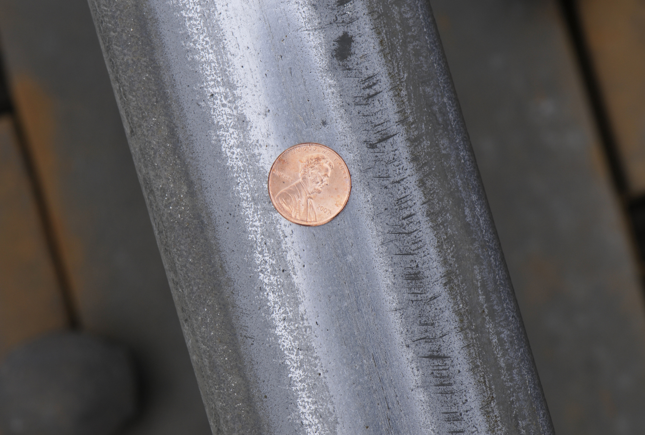 Penny and pennies on Hamptons Subway track
