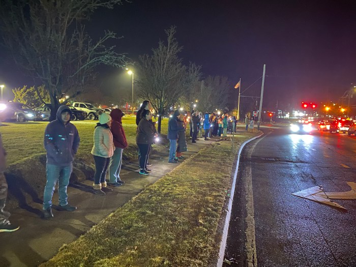 Anti-ICE protestors lined up along Montauk Highway in Hampton bays Friday