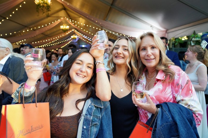 A lively crowd gathers to toast the season at Dan’s Taste Rosé Soirée.