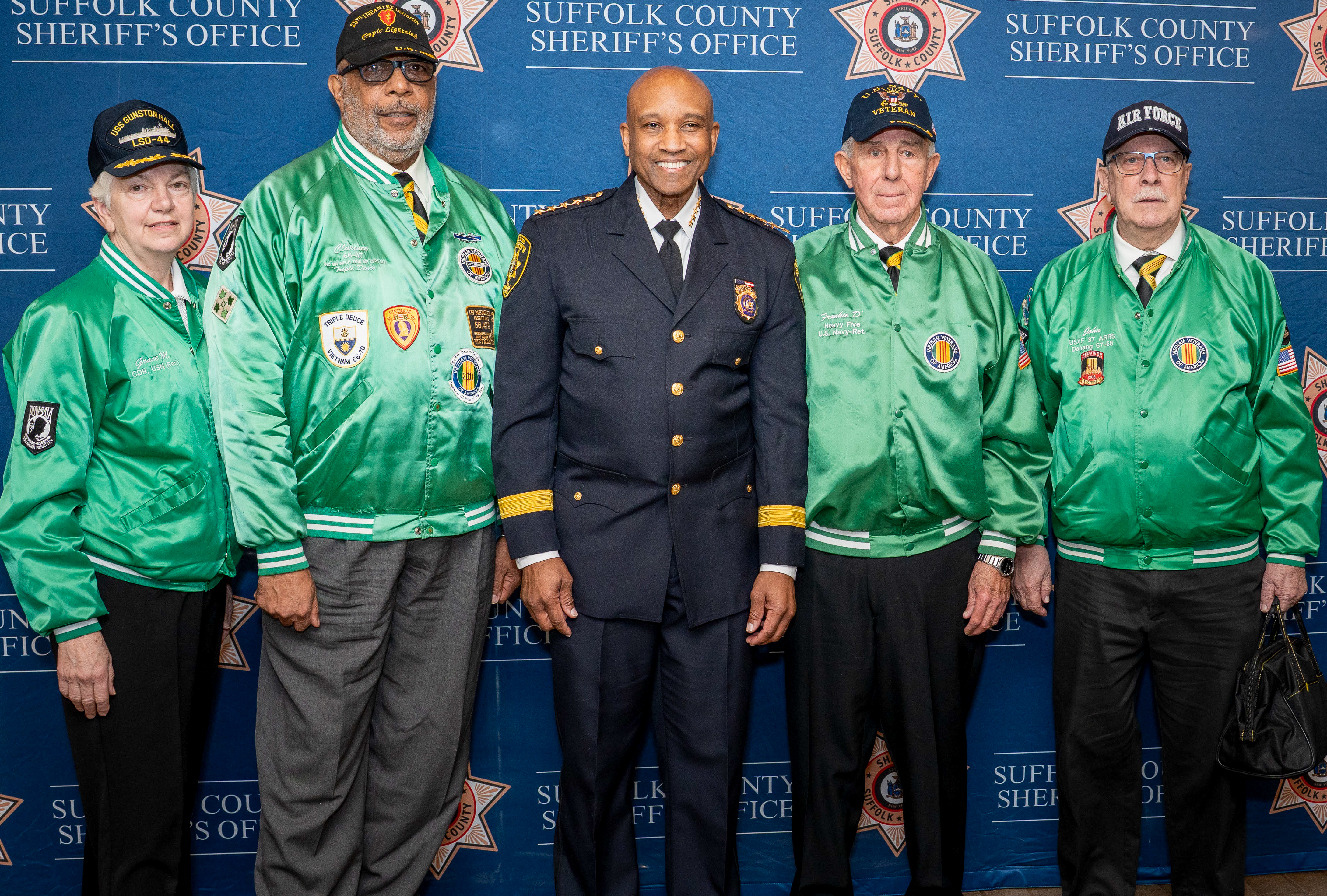 The Green Jackets- Grace Mehl, Clarence Simpson,Dr. Errol D. Toulon JR., Frank D Aversa, John Kuroly