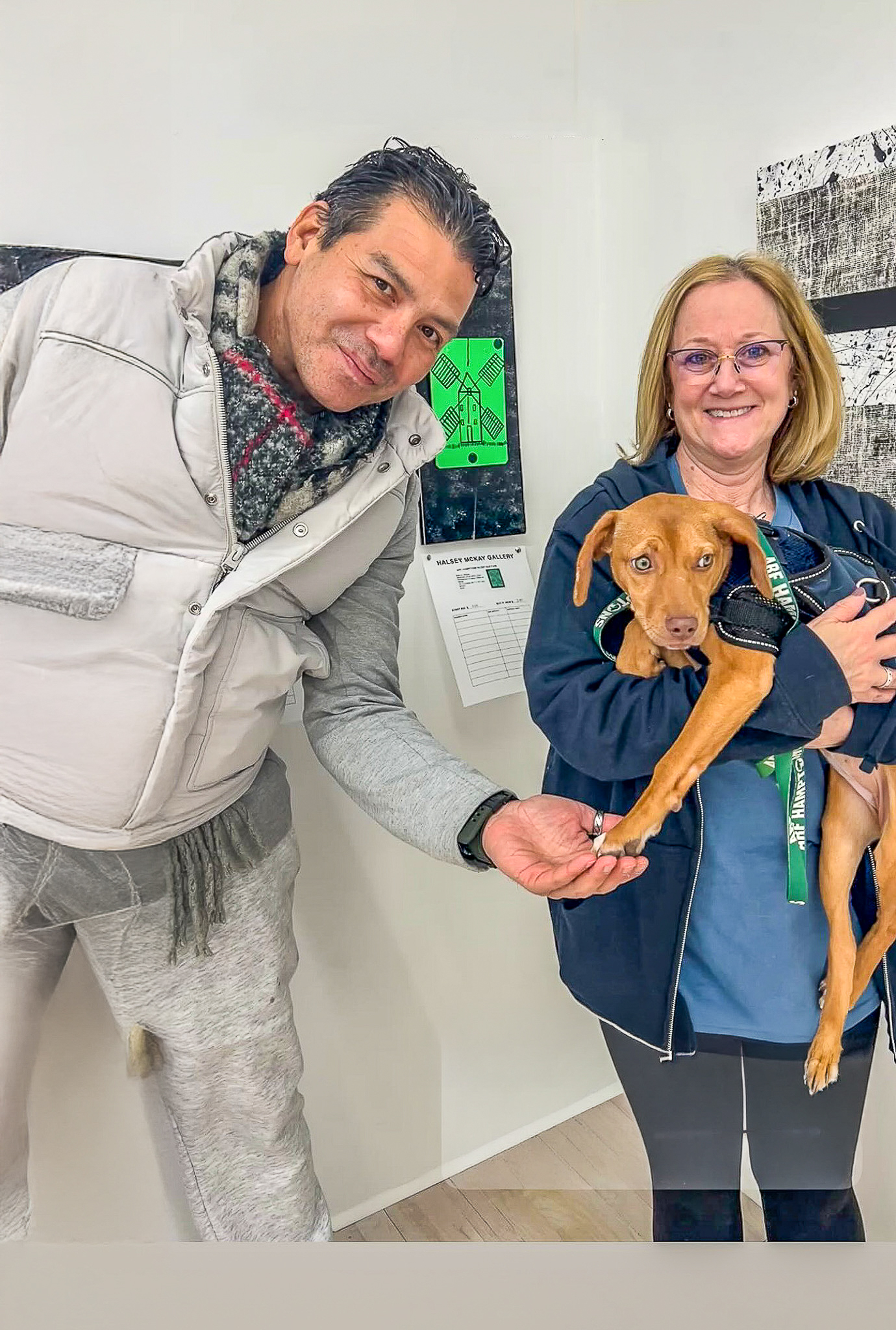 Artist Marcus Glittiris with ARF volunteer Joann Lobasso