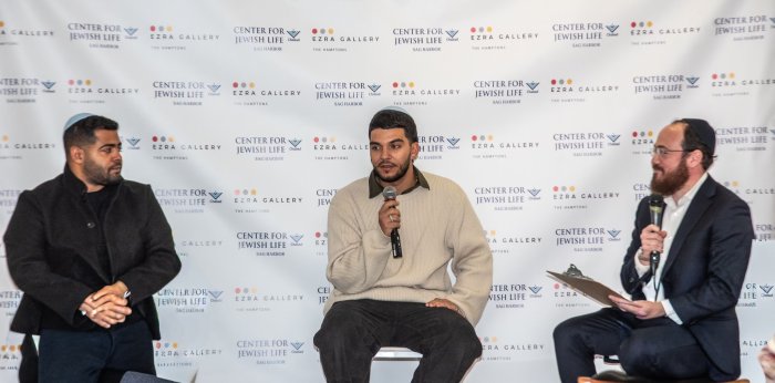 Daniel Sharabi, Yosef Chaim Ohana, and Rabbi Berel Lerman.